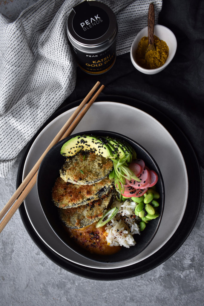 katsu gold dust next to prepared aubergine katsu curry bowl