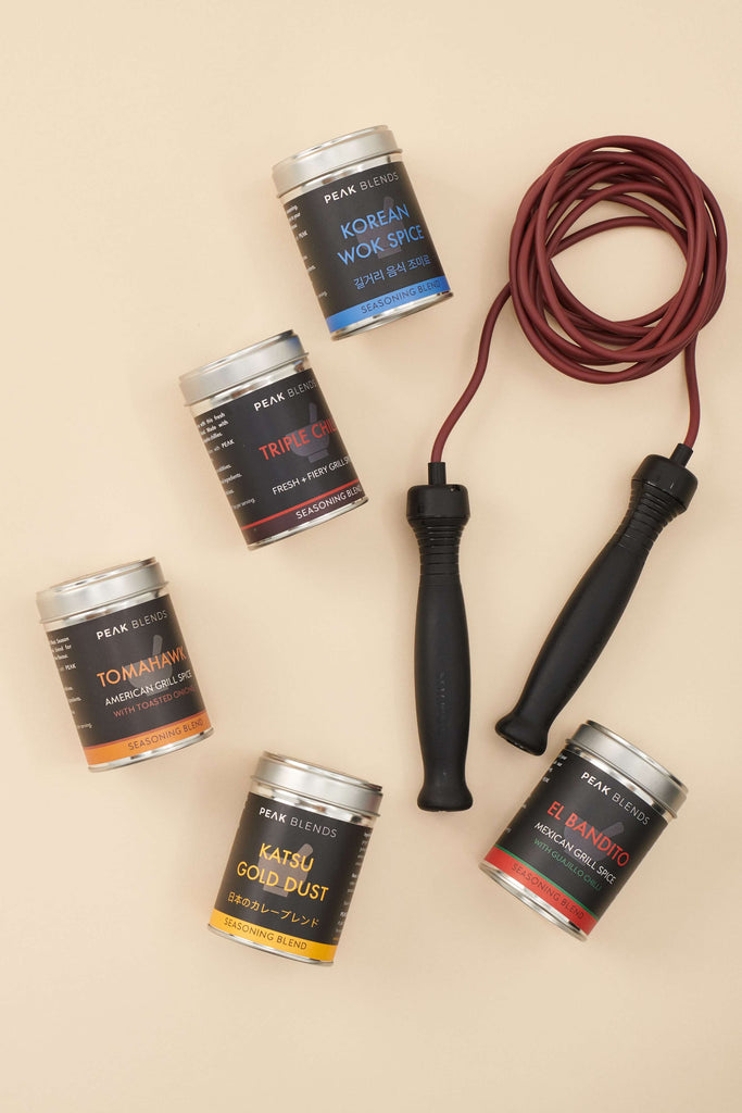 Peak Blends Tins on display with a skipping rope